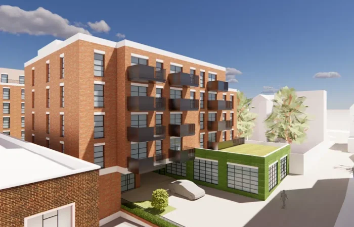 Modern brick apartment building with balconies.