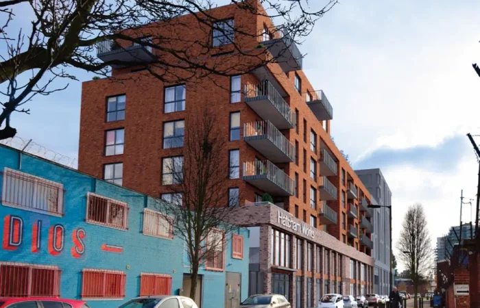 Modern apartment building with street view.