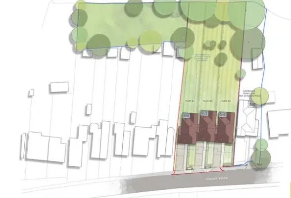 Site layout plan with houses and trees.