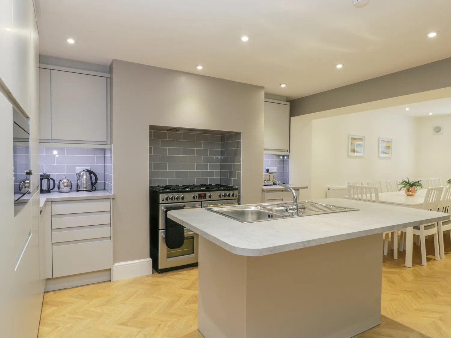 Modern kitchen with island and dining area