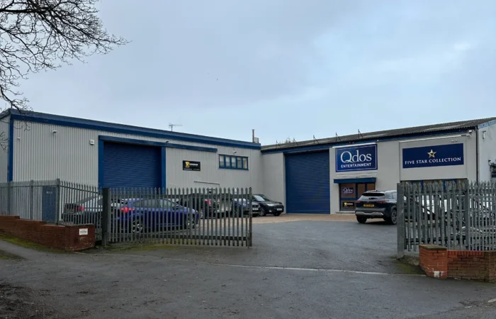 Warehouse with Qdos Entertainment signage